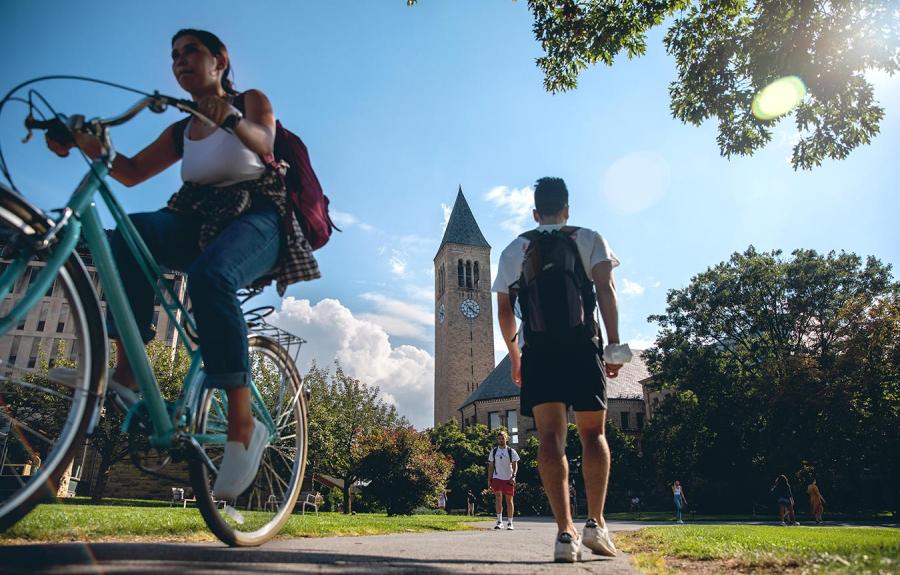 Students cross Ho Plaza between classes.