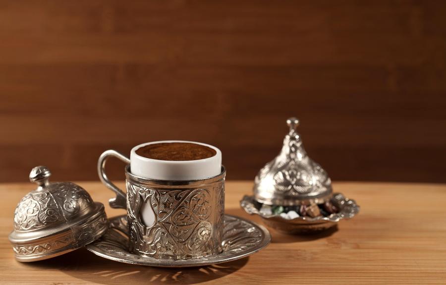 traditional Turkish coffee mug in ornate silver coffee set