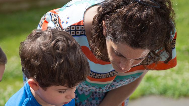 Lori Khatchadourian with a child