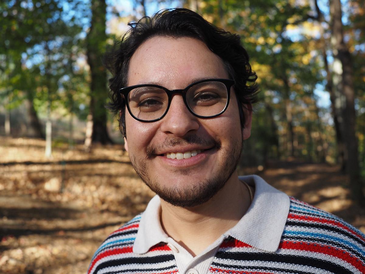 Cristian Gonzalez standing outside, smiling