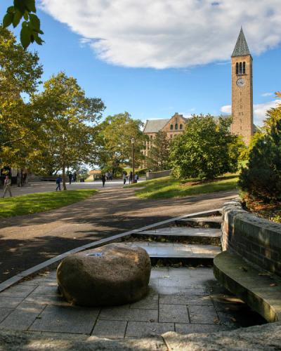 View of the Cornell clock tower from Ho Plaza in summertime