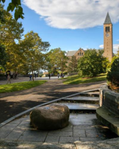 View of the Cornell clock tower from Ho Plaza in summertime