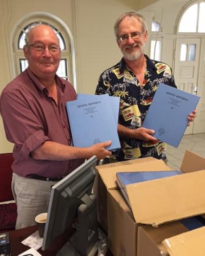 Jeffrey Zorn and Ilan Sharon, two of the co-authors of the recently published report on early G, show off copies of their new volumes.